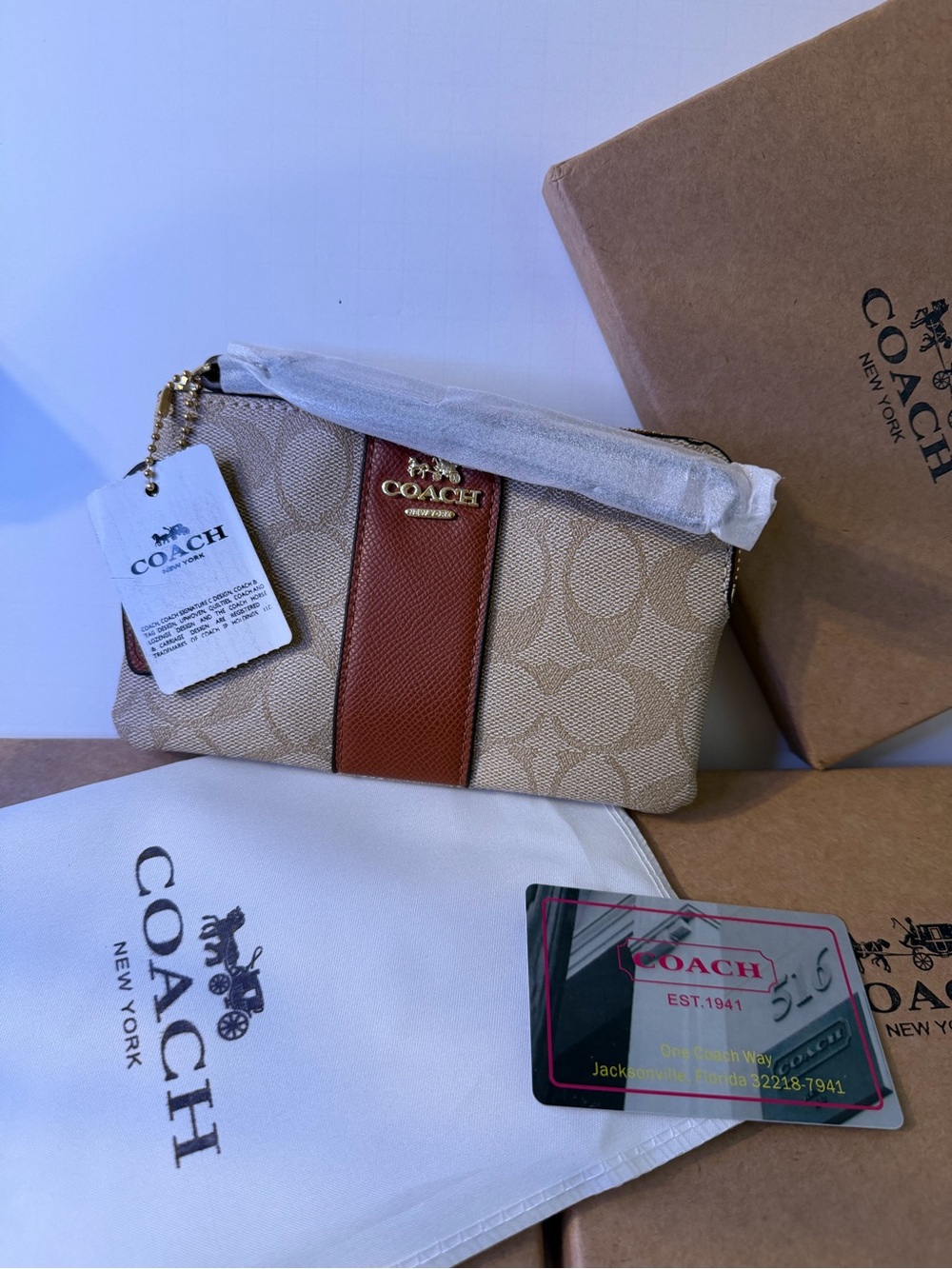 Coach Tan Signature Canvas Wristlet with Brown Center Stripe